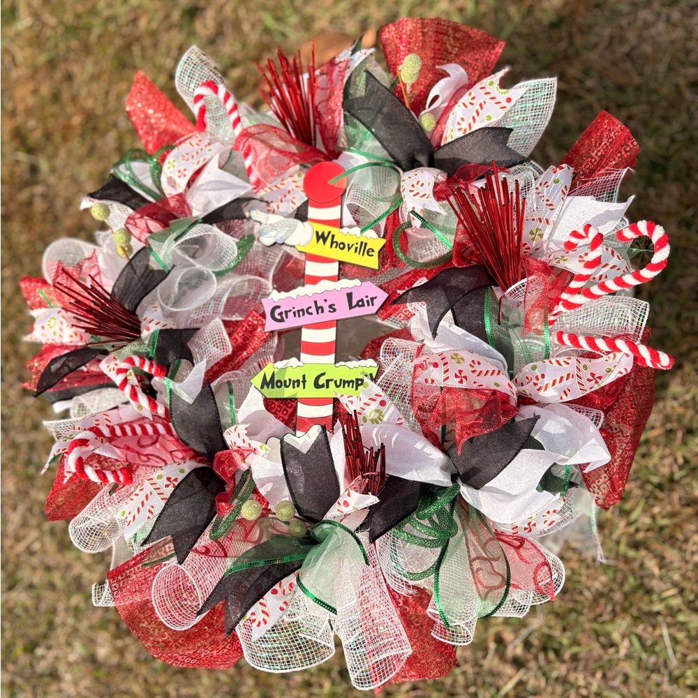 Festive Holiday Wreath with Red, Green, and Black Accents